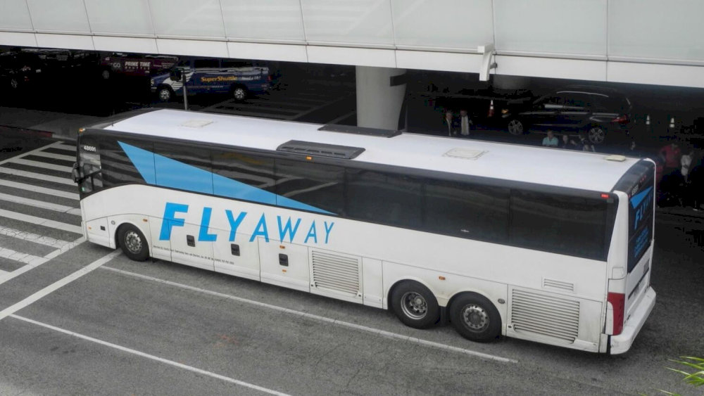 Passengers can board the FlyAway bus at the designated pick-up locations outside the terminals